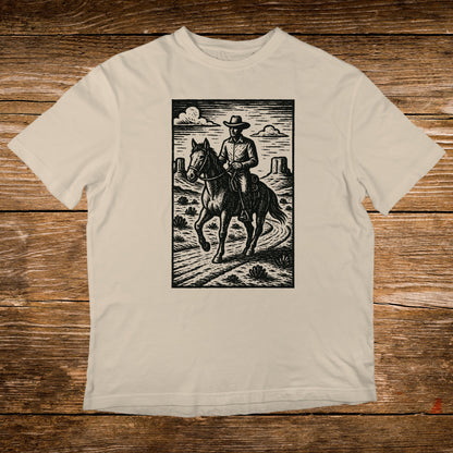Woodcut style illustration of a cowboy riding a horse through a desert landscape.
