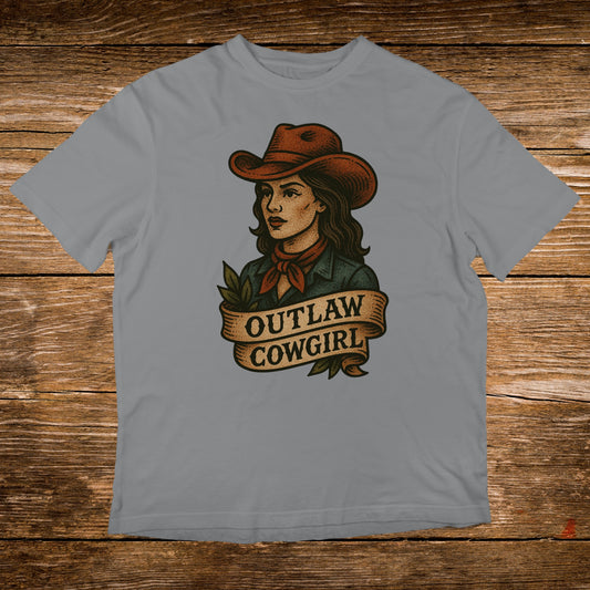 Outlaw Cowgirl illustration on a grey t-shirt.