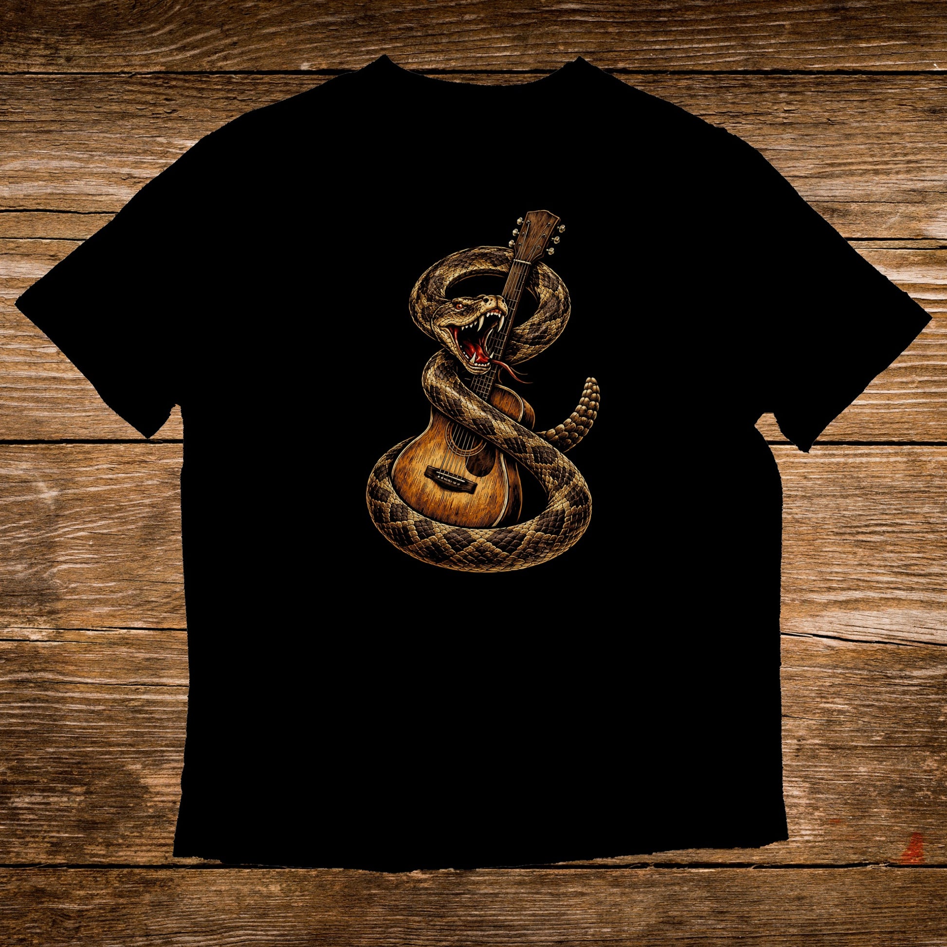 Rattlesnake coiled around a guitar on a black t-shirt.