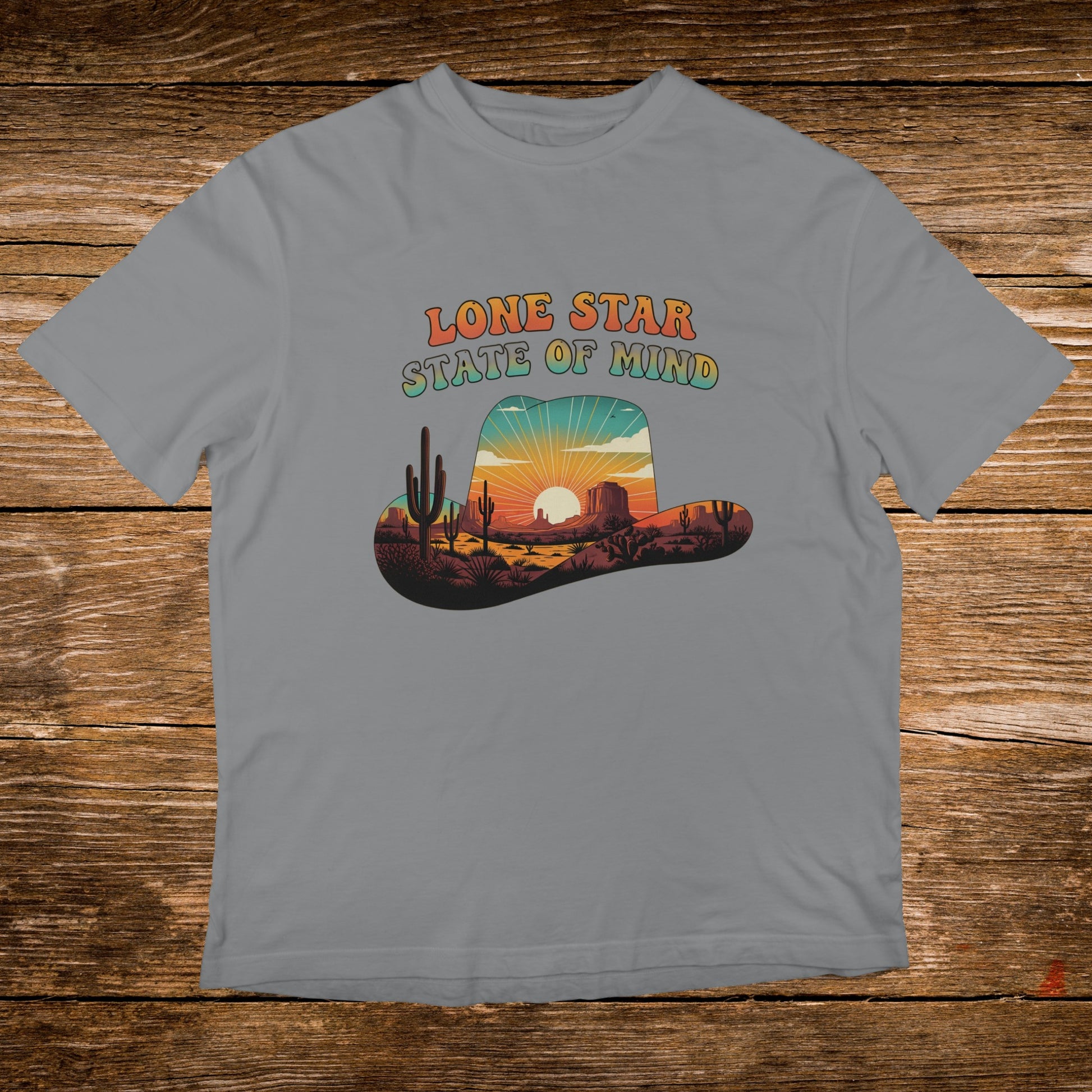 Grey t-shirt with "Lone Star State of Mind" text and desert landscape.