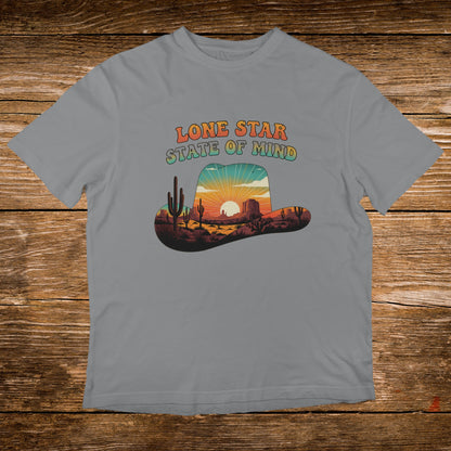 Grey t-shirt with "Lone Star State of Mind" text and desert landscape.