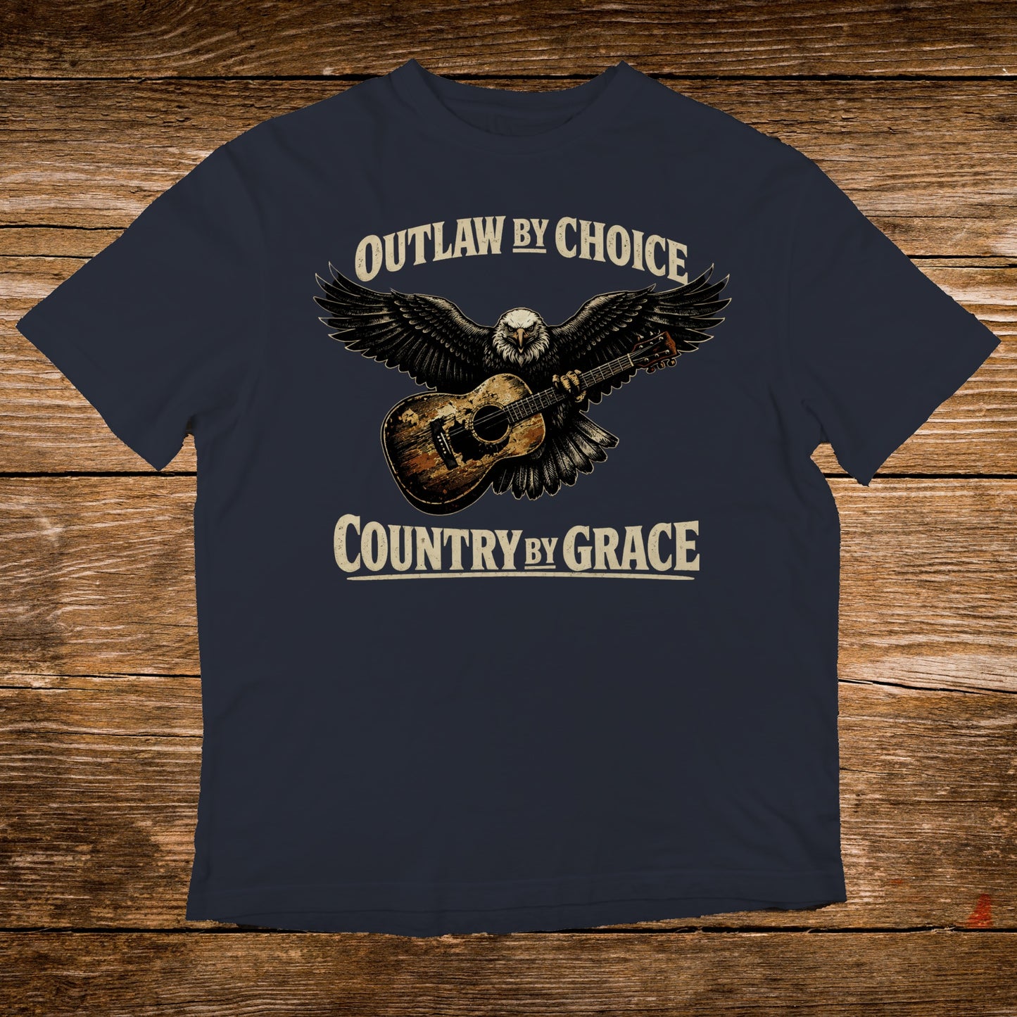 Navy t-shirt with eagle, guitar, and text "Outlaw by Choice, Country by Grace".