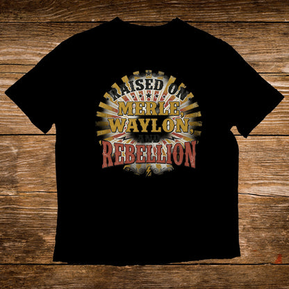 Black t-shirt with "Raised on Merle, Waylon, and Rebellion" text.