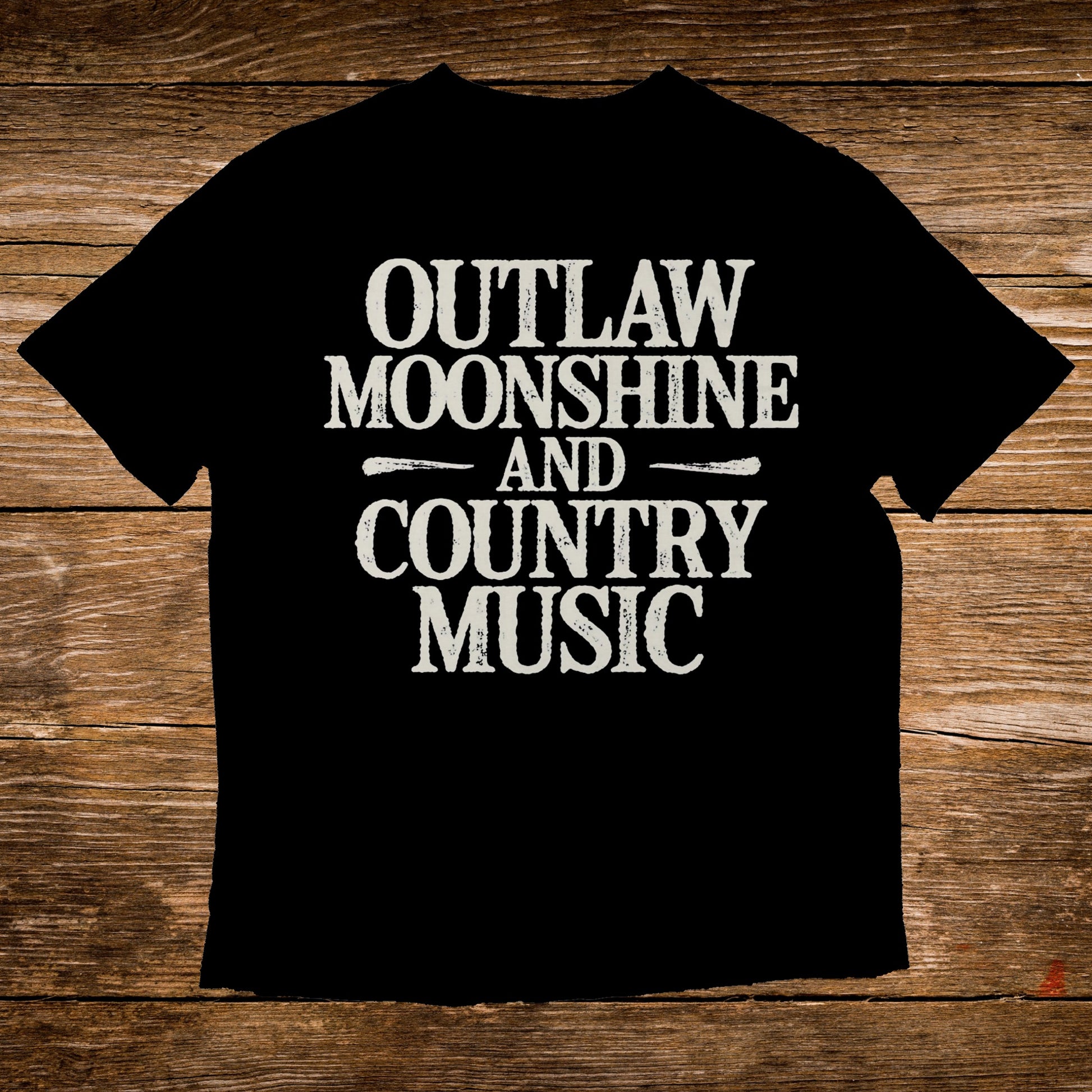 Black t-shirt with white text "Outlaw Moonshine and Country Music".
