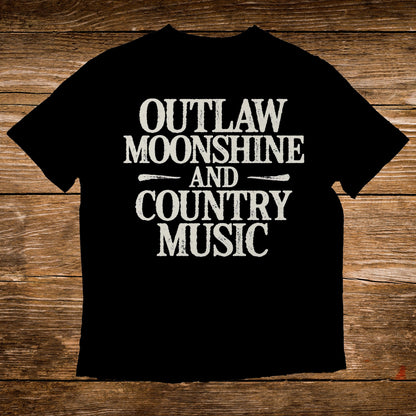 Black t-shirt with white text "Outlaw Moonshine and Country Music".