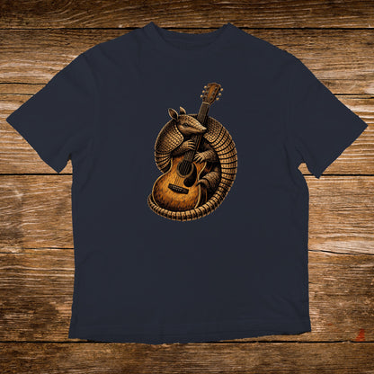 Armadillo playing an acoustic guitar, detailed illustration on a navy t-shirt.