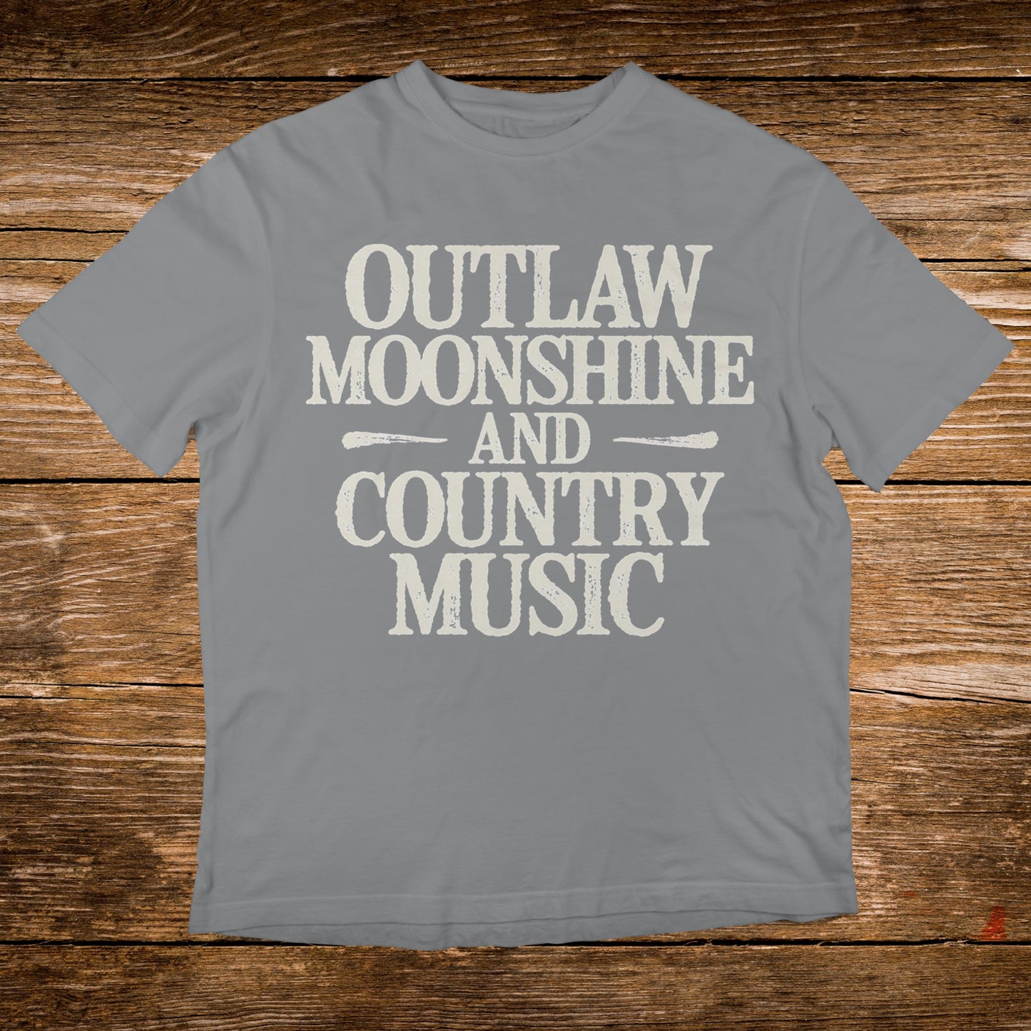 Grey t-shirt with "OUTLAW MOONSHINE AND COUNTRY MUSIC" text.