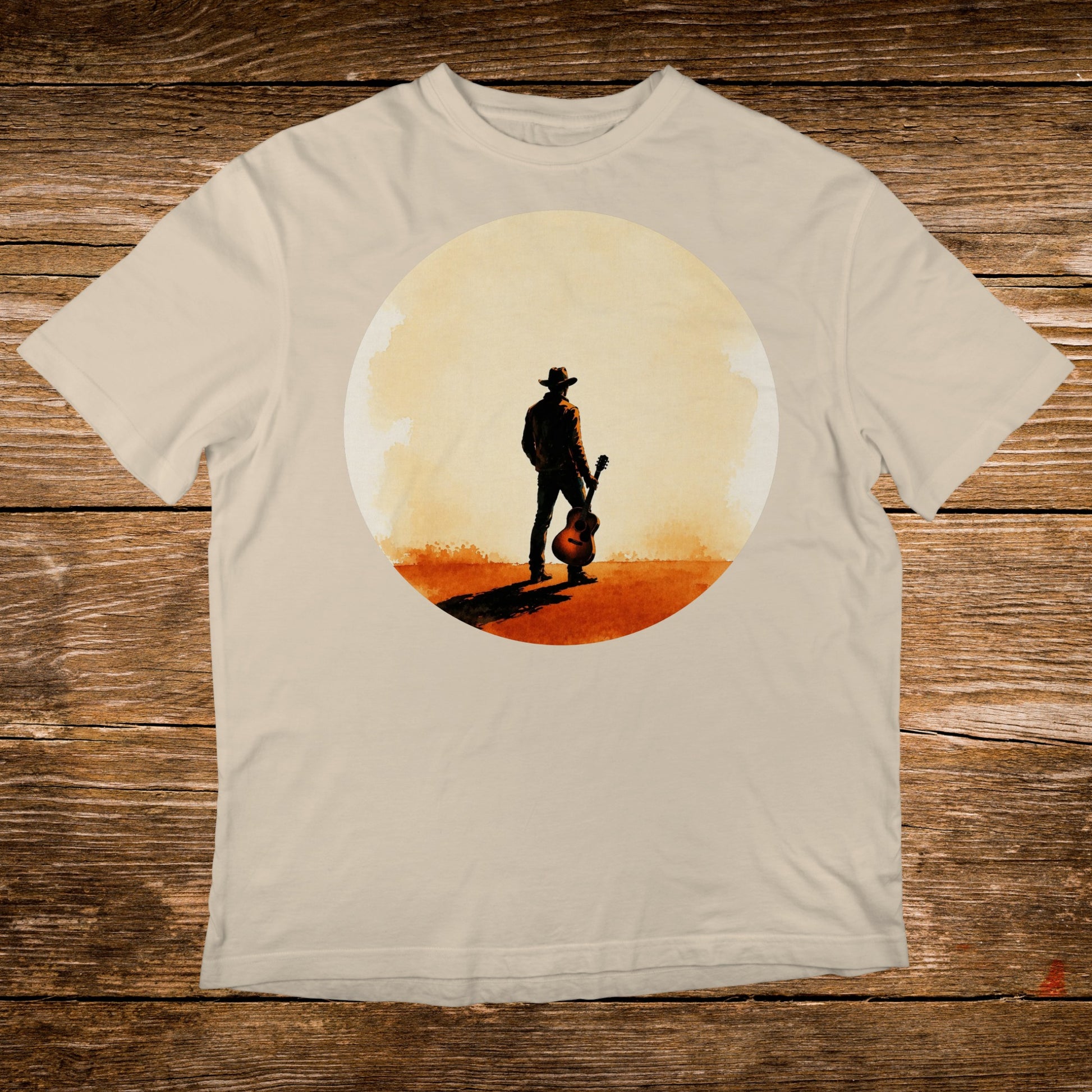 Man in cowboy hat holding acoustic guitar in sunlit desert landscape.