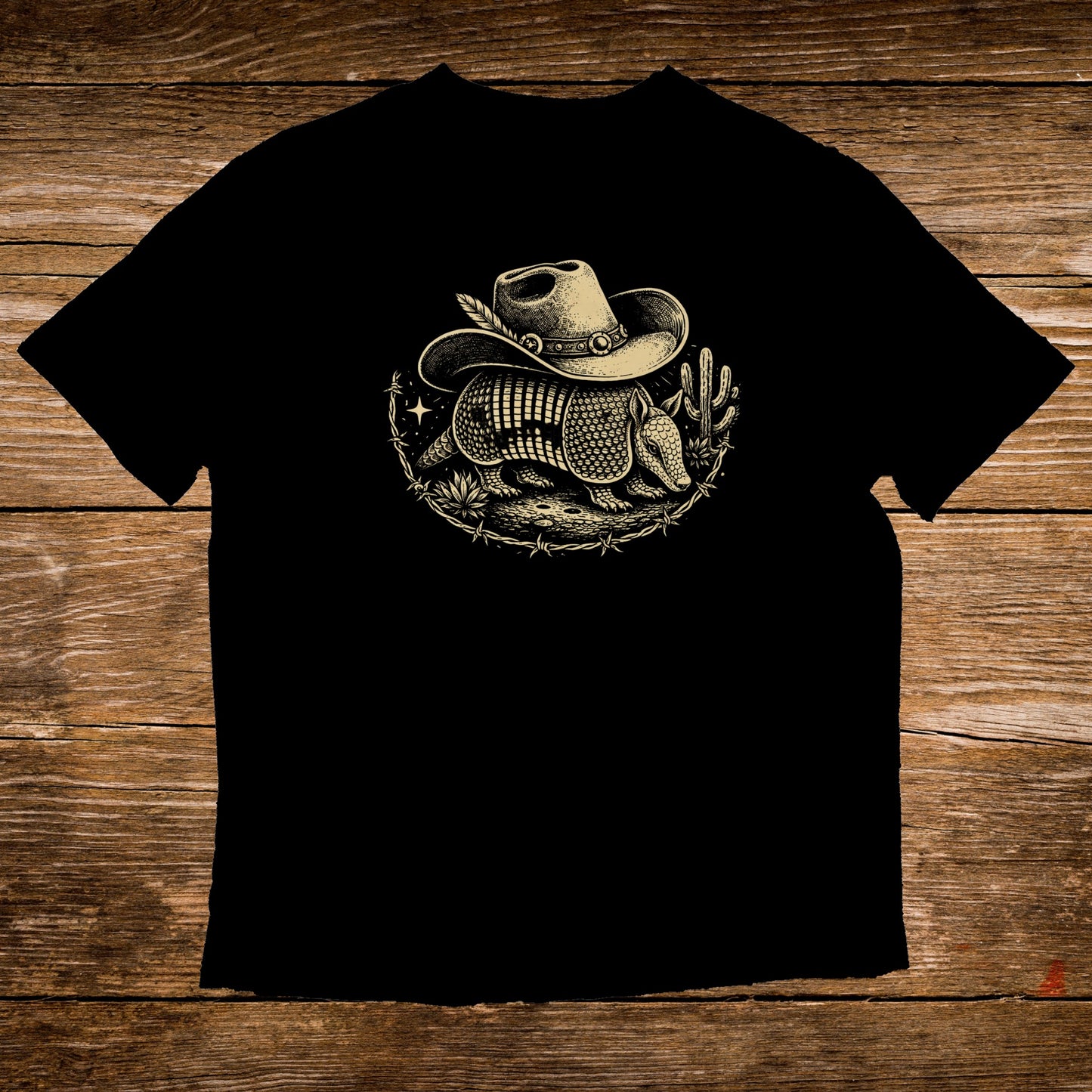 Armadillo wearing a cowboy hat and cactus illustration on a black t-shirt.