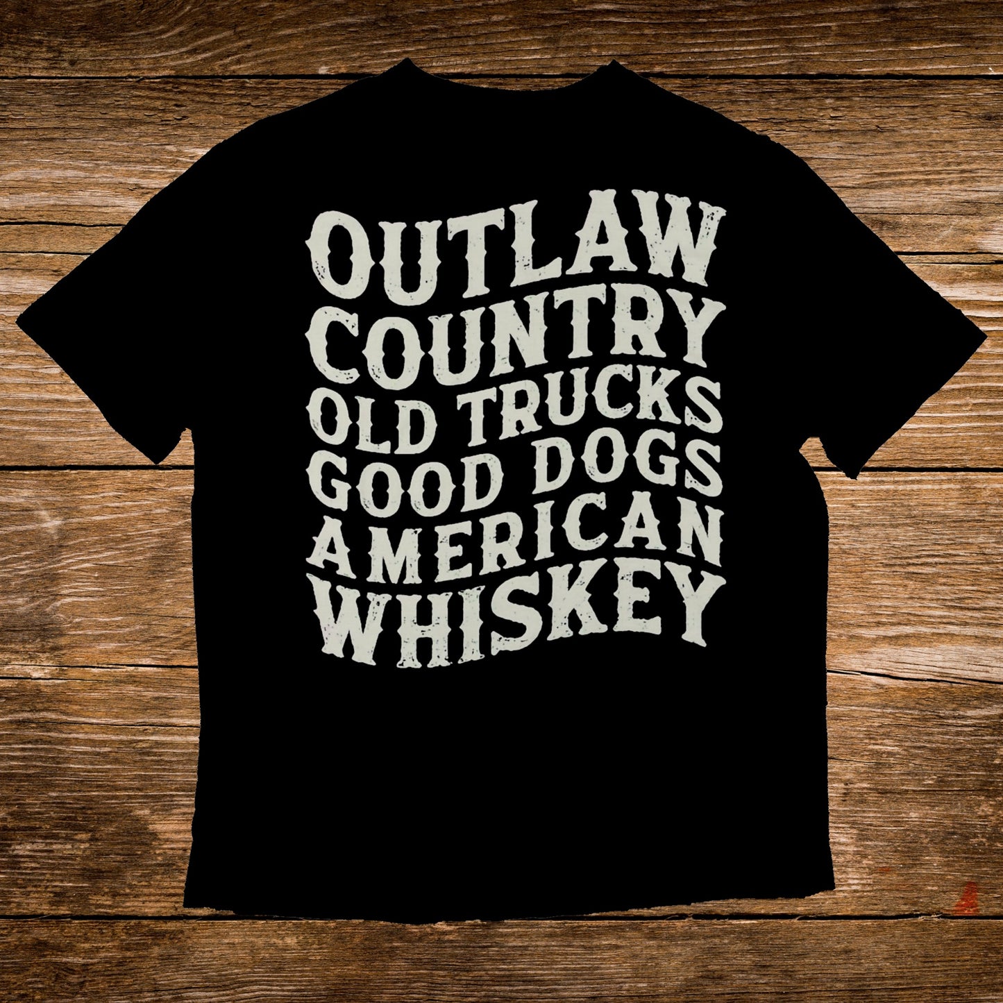 Black t-shirt with "Outlaw Country Old Trucks Good Dogs American Whiskey" text.
