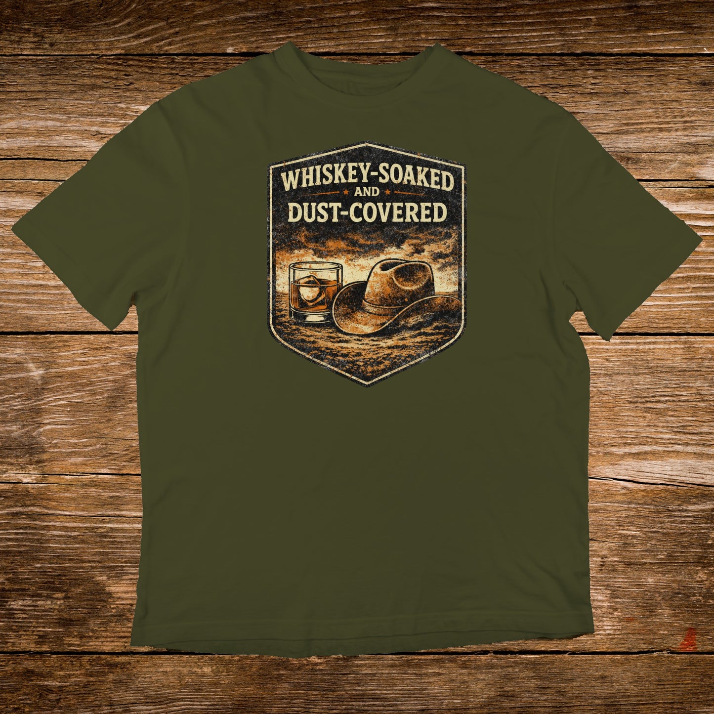 Olive t-shirt with a distressed graphic of a cowboy hat and whiskey glass.