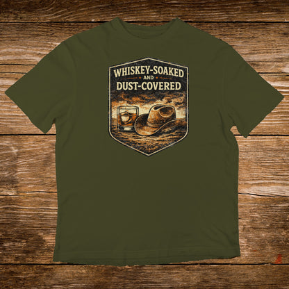 Olive t-shirt with a distressed graphic of a cowboy hat and whiskey glass.