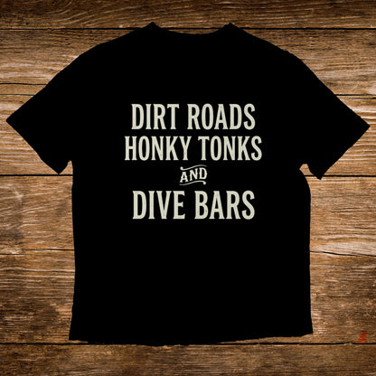 Black t-shirt with white text "Dirt Roads Honky Tonks and Dive Bars".