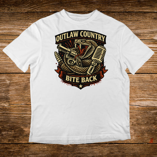 White t-shirt with Outlaw Country Bite Back graphic featuring snake, gun, and microphone.