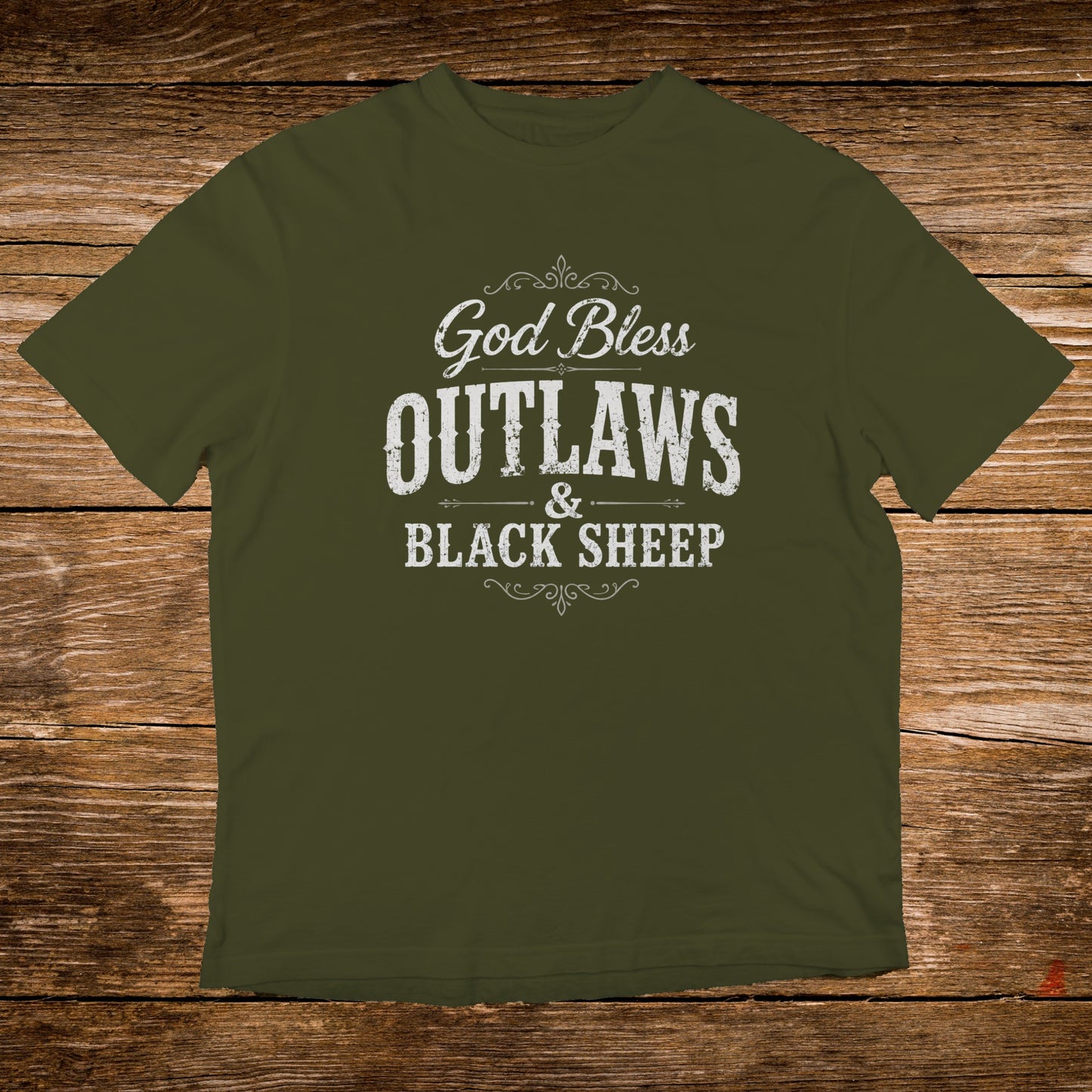 Olive green t-shirt with "God Bless Outlaws & Black Sheep" text.