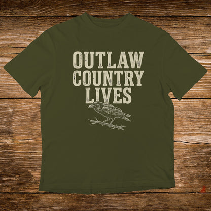 Olive t-shirt with "OUTLAW COUNTRY LIVES" text and crow graphic.