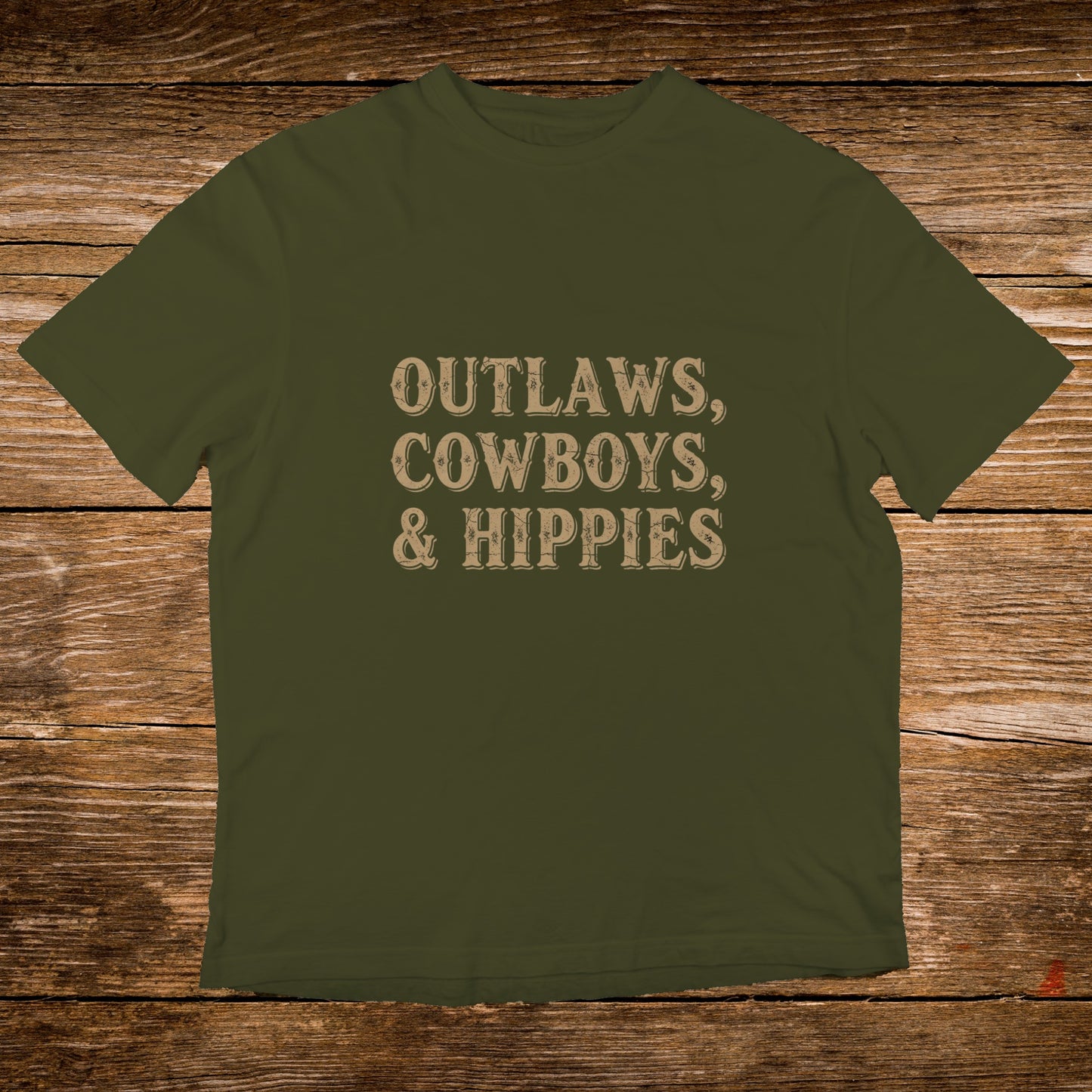 Olive green t-shirt with "Outlaws, Cowboys, & Hippies" text.