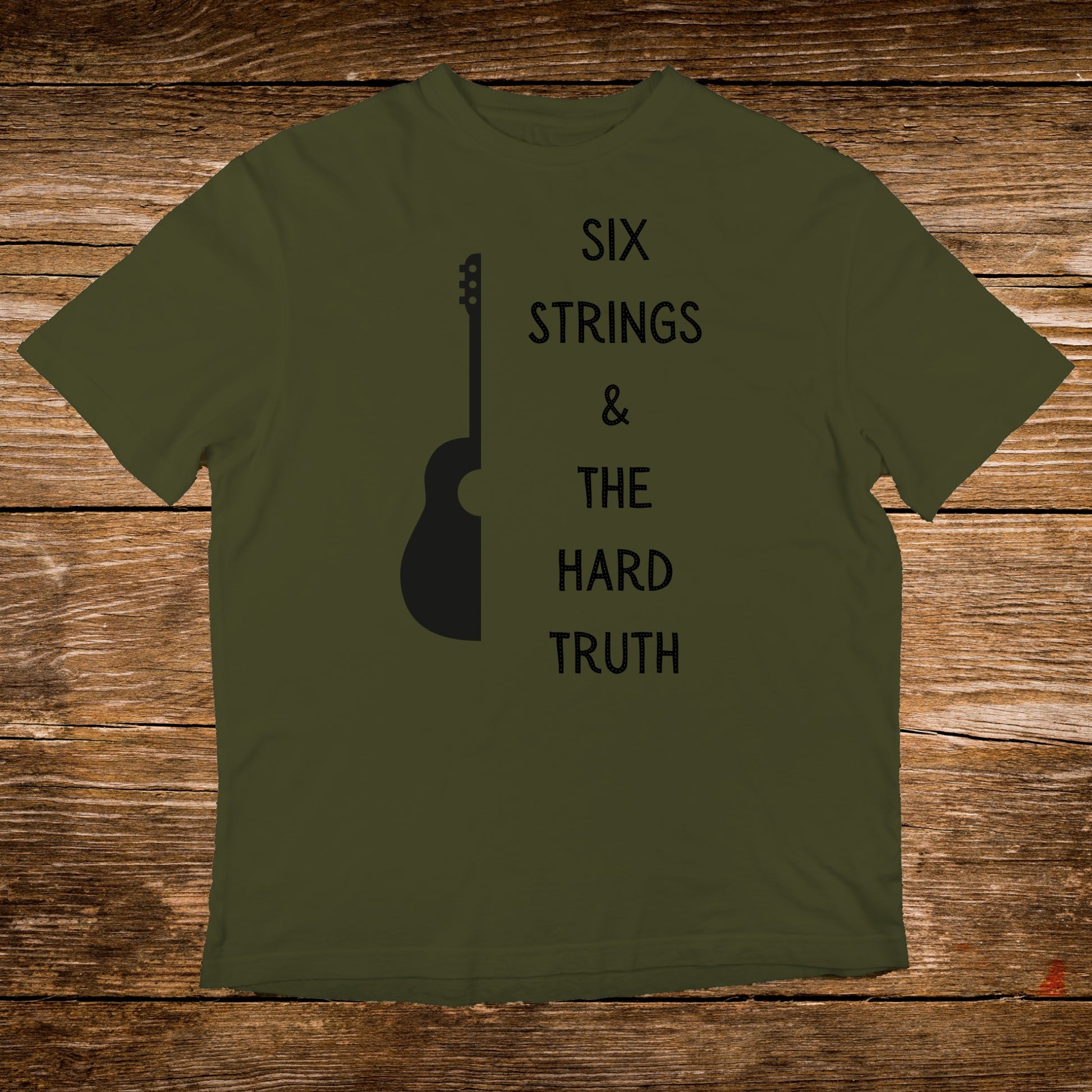 Olive green t-shirt with "SIX STRINGS & THE HARD TRUTH" and guitar silhouette.
