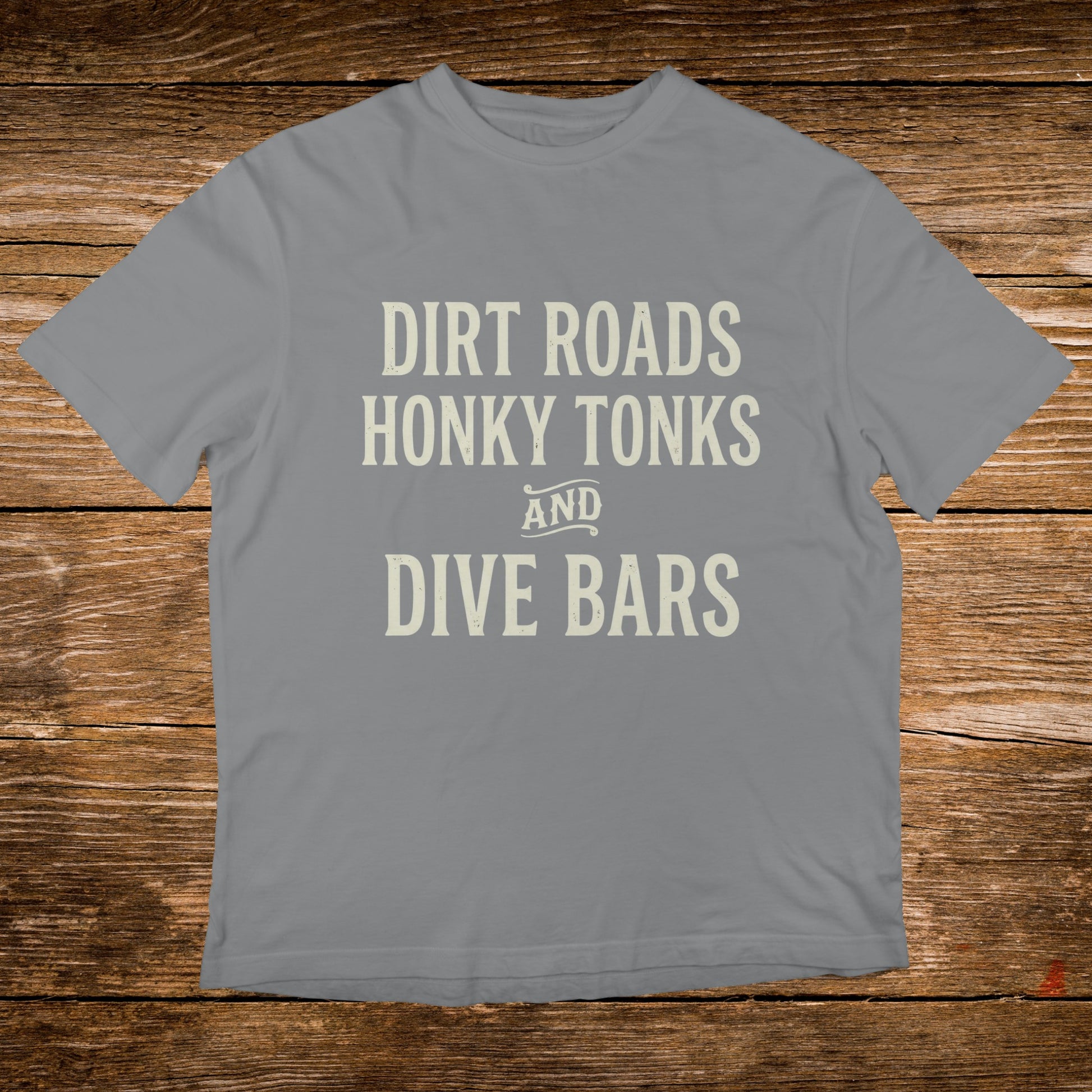 Gray t-shirt with "DIRT ROADS HONKY TONKS AND DIVE BARS" text.