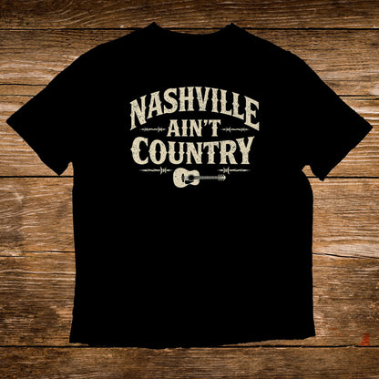Black t-shirt with "Nashville Ain't Country" text and guitar graphic.